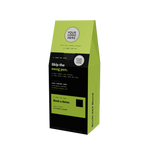 A custom printed paperboard coffee bag mockup with lime green and black panels, featuring placeholder text and logo areas, shown on a plain white background.