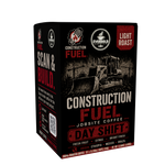 A single box of Construction Fuel Day Shift coffee, light roast, shown on a plain white background. The packaging is predominantly black with red and white text and graphics, featuring a bulldozer illustration.