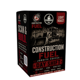A single box of Construction Fuel Day Shift coffee, light roast, shown on a plain white background. The packaging is predominantly black with red and white text and graphics, featuring a bulldozer illustration.