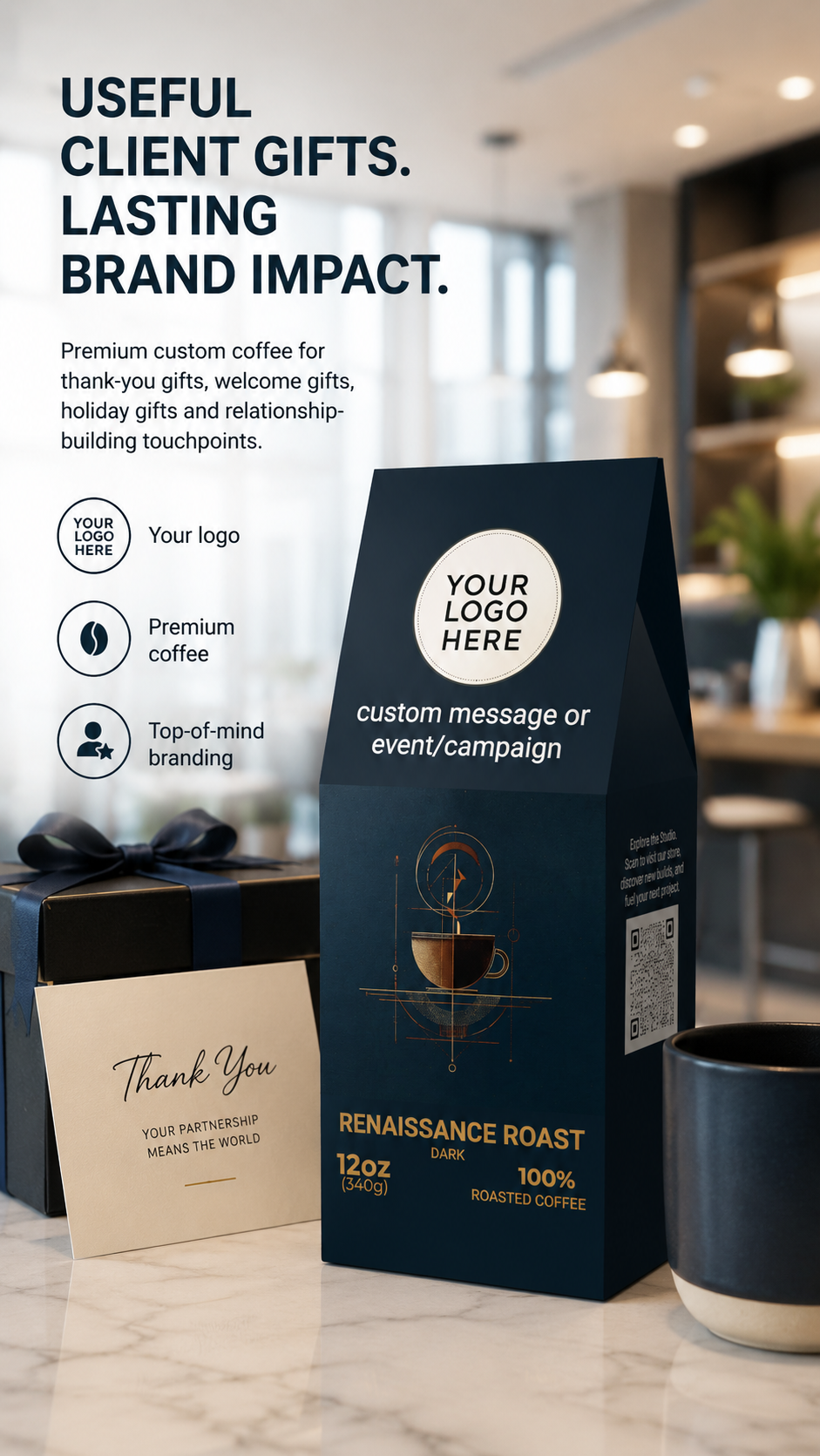 A premium coffee gift bag in dark navy blue stands on a marble countertop, with a matching dark gift box and a thank-you card beside it. The bag has placeholder branding text and a coffee cup illustration.